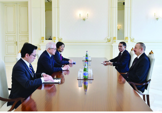 Президент Ильхам Алиев принял советника премьер-министра Японии по вопросам внешней политики