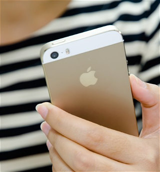 Apple готова выплатитьдо $500 млн за замедлениеработы старых iPhone