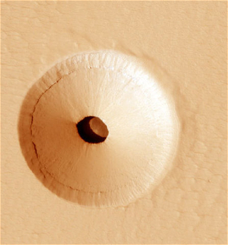 В NASA рассказалио потенциально обитаемой дыре на Марсе
