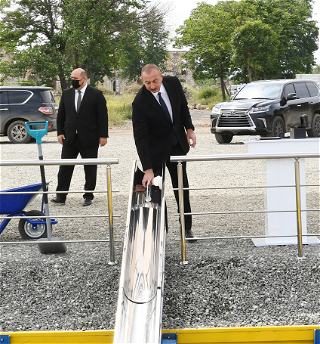 Президент Ильхам Алиев заложил фундамент нового зданияАгдамской городской школы №1 