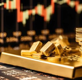 Цена на золото на мировом рынке повысилась почти на $98 долларов