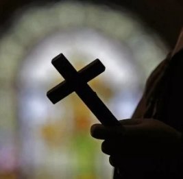 А еще рясу надел