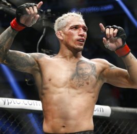 Оливейра победил Холлоуэя и стал чемпионом ВMF