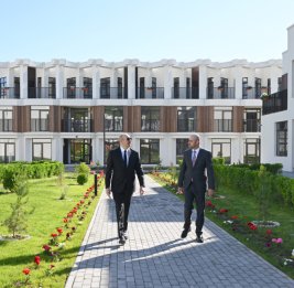 
Президент Ильхам Алиев принял участие в открытии первого жилого комплекса, построенного в городе Зангилан