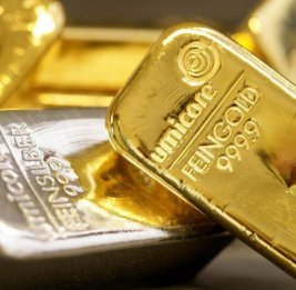 Золото и серебро подешевели на мировых биржах