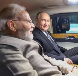 Моди опубликовал совместную с Путиным фотографию в автомобиле