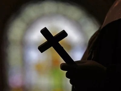 А еще рясу надел